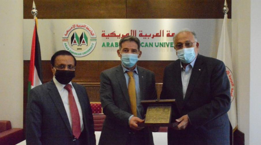 The Chairman of the Board of Directors, Dr. Yousef Asfour and Prof. Ali Zeidan Abu Zuhri- the University President while honoring the Head of the Anti-Corruption Commission, Mr. Ra’id Radwa. 
